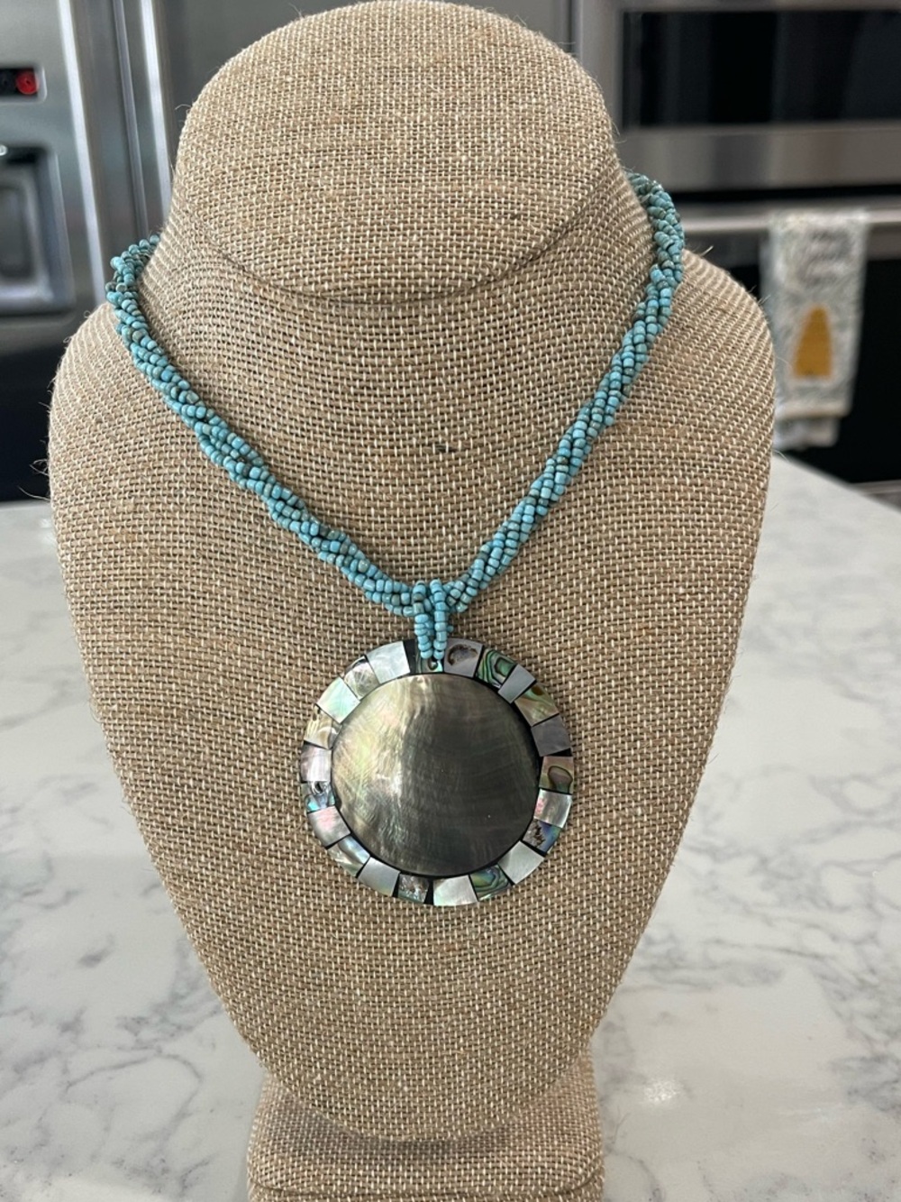 Turquoise Beaded Necklace with Iridescent Shell Medallion